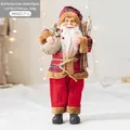 Standing small red Santa Claus figurine with red-black plaid trim and burlap gift bag - Red Small