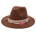 Close-up of bohemian hat band featuring colorful tassels and natural shell charms - Coffee
