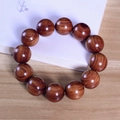 Green sandalwood prayer beads bracelet with natural polished grain in deep reddish brown - 10mm / Dalbergia Bariensis