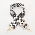 Detail of 5cm wide woven shoulder strap with black white geometric patterns and gold metal clips - Dark Coffee