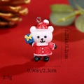 Macro view of Christmas bear resin pendant with precise height and weight measurements - Christmas Bear with Blue Gift Box