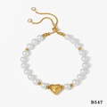 Adjustable gold heart pendant bracelet with white pearls and sparkling crystal ends - Gold Bracelet (B547)