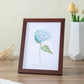 Minimalist dark brown wood grain photo frame with blue hydrangea watercolor art display - Redwood