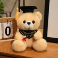 Plush graduation teddy bear in apricot color with black doctoral cap and scroll - Bandana Style / Tan