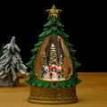 Close-up of glowing Christmas tree snow globe with snowman and warm festive lights - Christmas Tree Three Snowmen