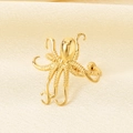 Detailed close-up of golden octopus-shaped stainless steel ring on beige textured fabric - Octopus Style (KR113366-SP)