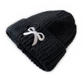 Kids black knit beanie featuring a cute white bow embroidery and warm ribbed texture - Black
