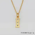 Collier en acier titane avec pendentif lettre 'I' doré et pierres de zircon - Lettre I