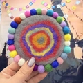 Handheld grey wool felt stone-shaped heat resistant mat with rainbow pattern - Grey Base (Random Colored Circles)