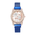Close-up of blue mesh strap and rose gold bezel with rhinestones and dolphin dial - Blue