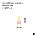 Macro detail of pink zircon pendant in 4-claw gold plated setting with 2mm hole - Round Pendant-H