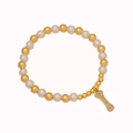 Fashionable beaded bracelet with gold metal beads, white pearls and a crystal bone pendant - Letter I