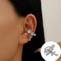 Silver cuff earring with zircon inlay and cross pendant shown on model ear - White K - Cross Pendant Style (X283)