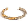 Twisted cuff bracelet with 18K gold plating and pave-set rhinestones in gold - Asymmetric Twist White Zircon Bangle - Gold