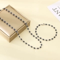Zilveren sieradenset met zwarte boze oog bedeltjes, inclusief ketting en armband - Armband 19CM / Zwart