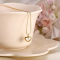 Titanium steel heart pendant necklace with gold frame and white shell inlay on ceramic cup - Shell Heart Necklace