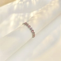 Adjustable silver geometric ring with pink zircon stones on a white stand - Adjustable Open / Silver with Pink Zirconia