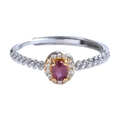 Adjustable silver ring featuring an oval red gemstone set in a golden bezel with accent stones - Ruby Style (LR084)