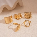 Set de cinco anillos dorados geométricos con diseños irregulares y espirales minimalistas - Juego de 5 piezas dorado