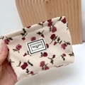 Corduroy makeup bag with red floral rose pattern and decorative woven label detail - Small / Beige Rose