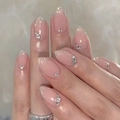 Pink glitter press-on nails with rhinestone accents in long almond shape for women - Bz1439 Starlight Shines / Jelly Glue + Nail File