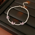 Bracciale argento con farfalle in zircone viola e chiusura a moschettone regolabile - Bracciale Farfalla Viola (39#) / Argento-Viola