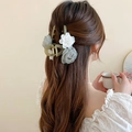 Elegant green hair claw clip with white floral accents shown on a braided hairstyle - 15# Hair Claw-Green Flower