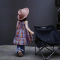 Pink woven straw sun hat for girls paired with a vibrant colorful checkered tiered dress - Deep Pink