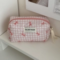 Detail of pink gingham quilted makeup bag with red bow prints and ribbon zipper pull - Pencil Case / Pink