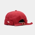 Detail of red miki hat featuring white polar bear embroidery and adjustable metal strap - Adjustable / Red