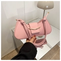 Detail of light pink rectangular shoulder bag with golden metal buckle and knot strap - Pink