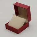 Red lychee texture watch box with beige velvet cushion in an open view display - Red Exterior Beige Interior