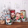 Set di 4 calze natalizie con personaggi 3D in feltro tra cui Babbo Natale e renna - Set di 4 calze grandi in juta