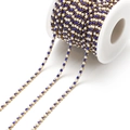 Golden chain variant with deep blue rhinestones and white pearls on a spool roll - 2.5mm Blue