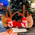 Christmas hair clips featuring brown antlers and snowman with red pom-pom details - A18# Snowman Style