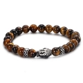 Macro shot of tiger eye beads and engraved metal buddha charm on the vintage bracelet - Brown Tiger Eye Buddha Head Style (KB60923-BD)