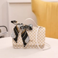 White small handbag with yellow clover prints and decorative silk scarf ribbon tie - White