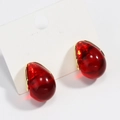 Elegant red teardrop earrings with gold metal trim and resin finish on display card - Red Teardrop (Gold)