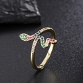 Macro view of gold snake ring with vibrant green pink and blue zircon stones detail - Multi-color Zircon Gold Snake Ring