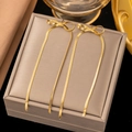 Elegant gold bow earrings with long tassel chain detail displayed on a jewelry box - Bowknot Tassel Earrings(AG219) / Gold