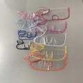 Transparent waterproof pet raincoats with colorful trims and snap button closures - XS / Red Edge