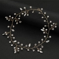 Detailed close-up of handmade bridal headband with gold wires and sparkling marquise crystals - Gold