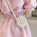 Handmade beaded pearl crossbody bag for kids featuring a round white acrylic design - Shoulder Style / White