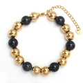 Polished stainless steel beaded bracelet featuring alternating gold and black beads - 10mm / Black & Gold