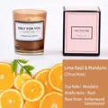 Lime Basil & Mandarin scented candle in brown glass jar with pink gift box packaging - Amber (Citrus)