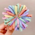 Close-up of vibrant macaron-colored wavy elastic hair bands with high-stretch fabric texture - Macaron Light Color Scalloped Edge (1 Pack of 50)