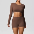 Detail view of coffee brown two-piece yoga set with long sleeve crop top and shorts - S / Chestnut Brown