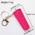 Macro detail of pink studded miniature cup keychain with dimensions 3.1x7.5 cm - Barbie Pink Studded Cup (Gold Clasp)