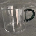 Transparent borosilicate glass teacup with a stylish dark green handle and sleek design - Lake Green Handle