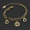 Double-layered gold stainless steel bracelet with hollow letter D pendants and dual chains - Gold